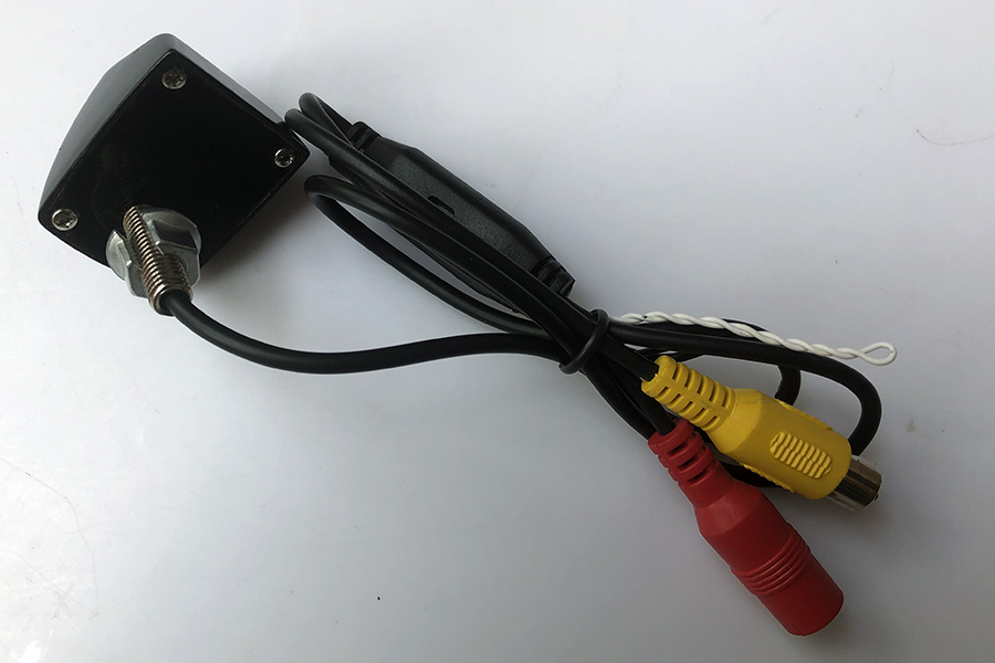 Universal reversing camera drill hole